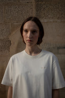 The cream T-shirt