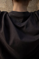 The gray T-shirt